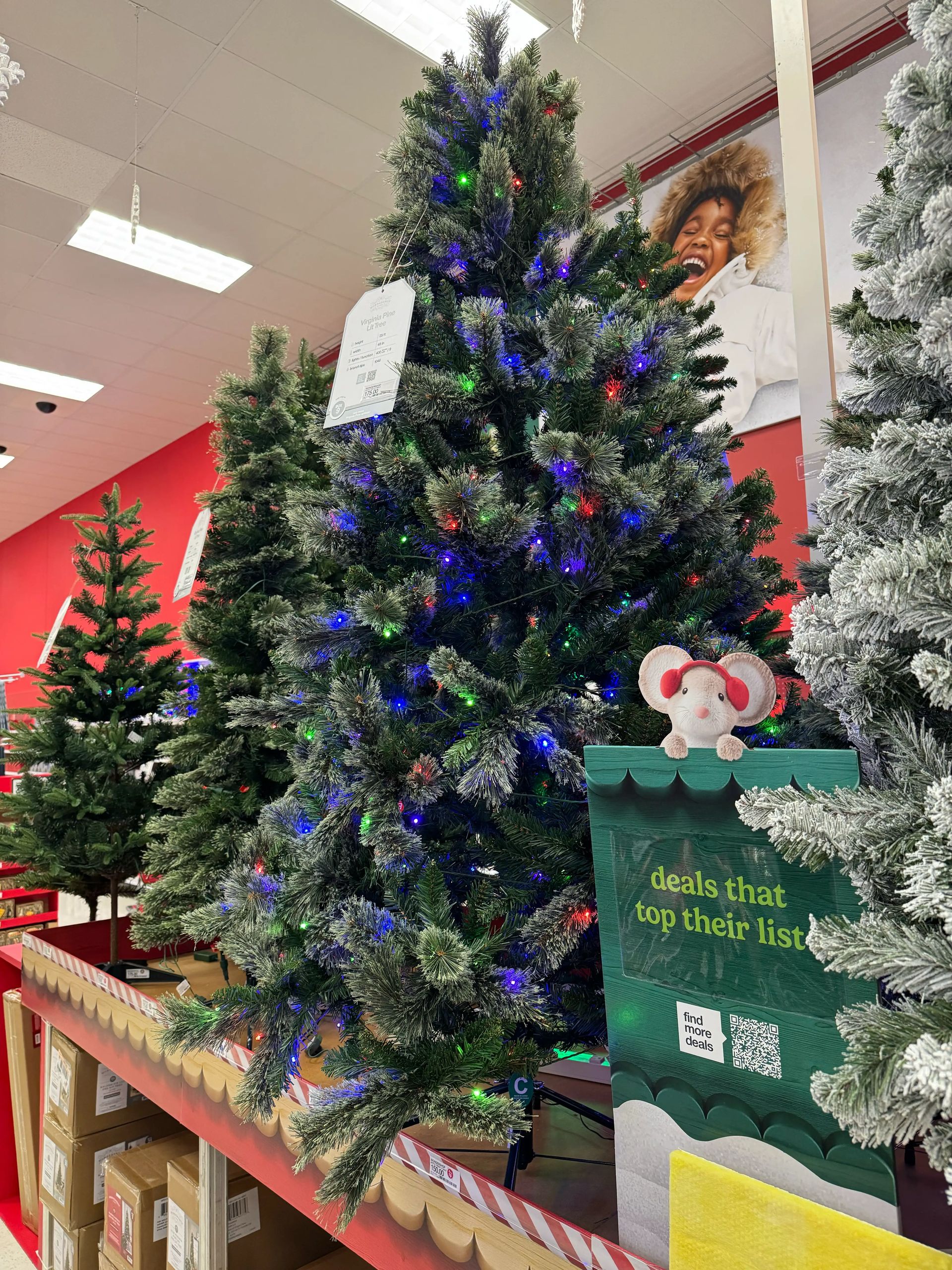 Mixed PVC/PE pine with frosted tips, dense branching, multicolor mini bulbs throughout, full conical shape