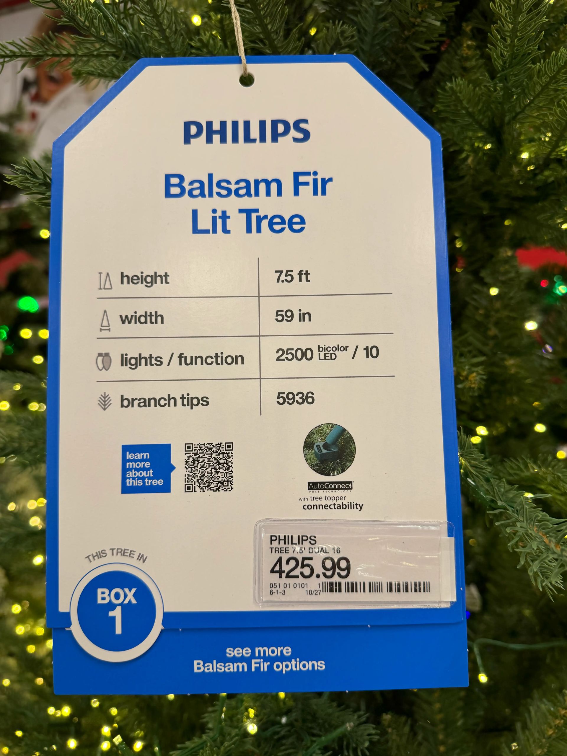 Product tag showing 7.5ft Balsam Fir specifications: 59in width, 2500 bicolor LEDs, 5936 branch tips, $425.99
