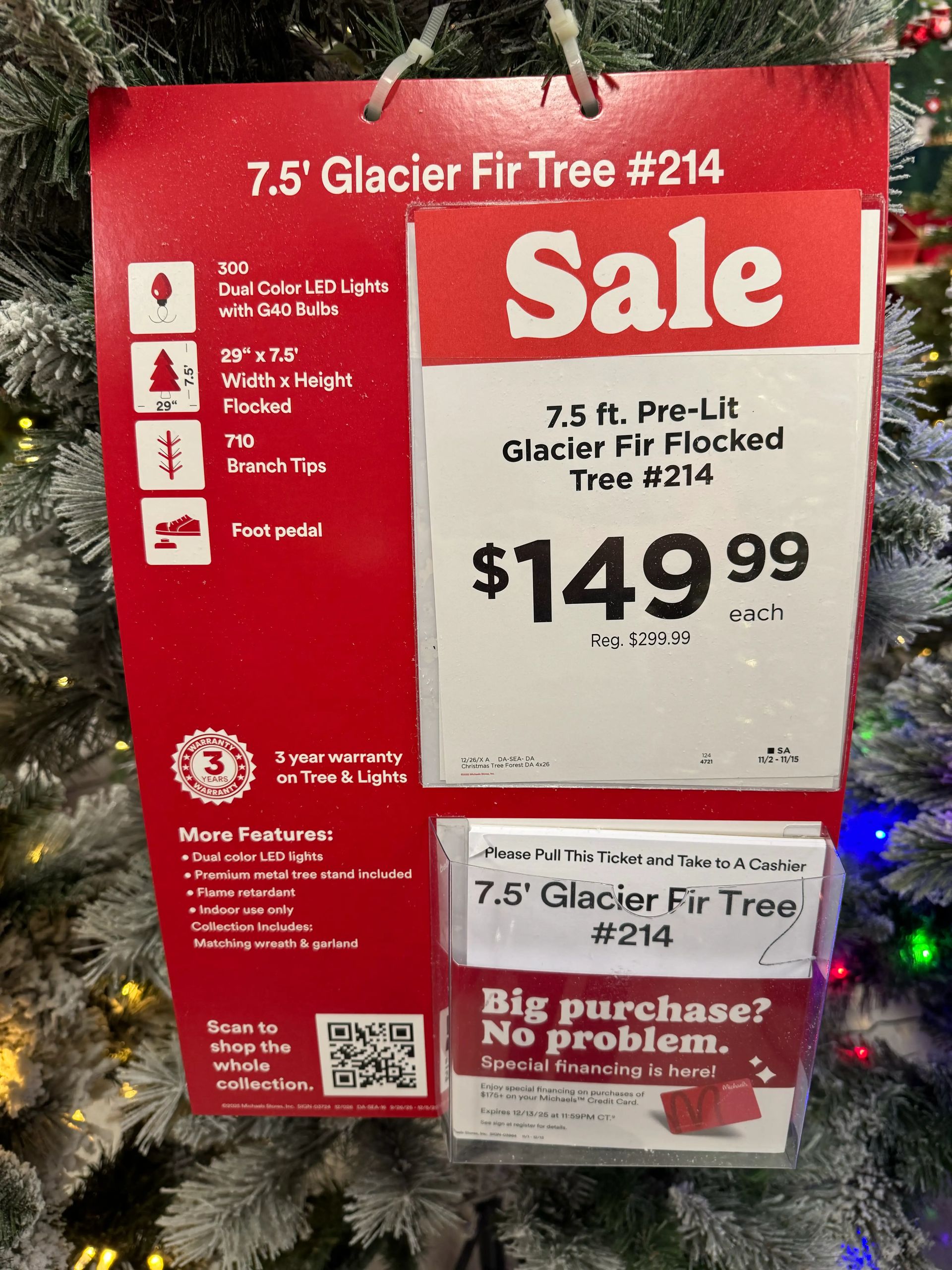 Product sign showing 7.5ft Glacier Fir specs: 300 dual-color LED lights, 29x7.5ft dimensions, 710 tips, $149.99 sale price