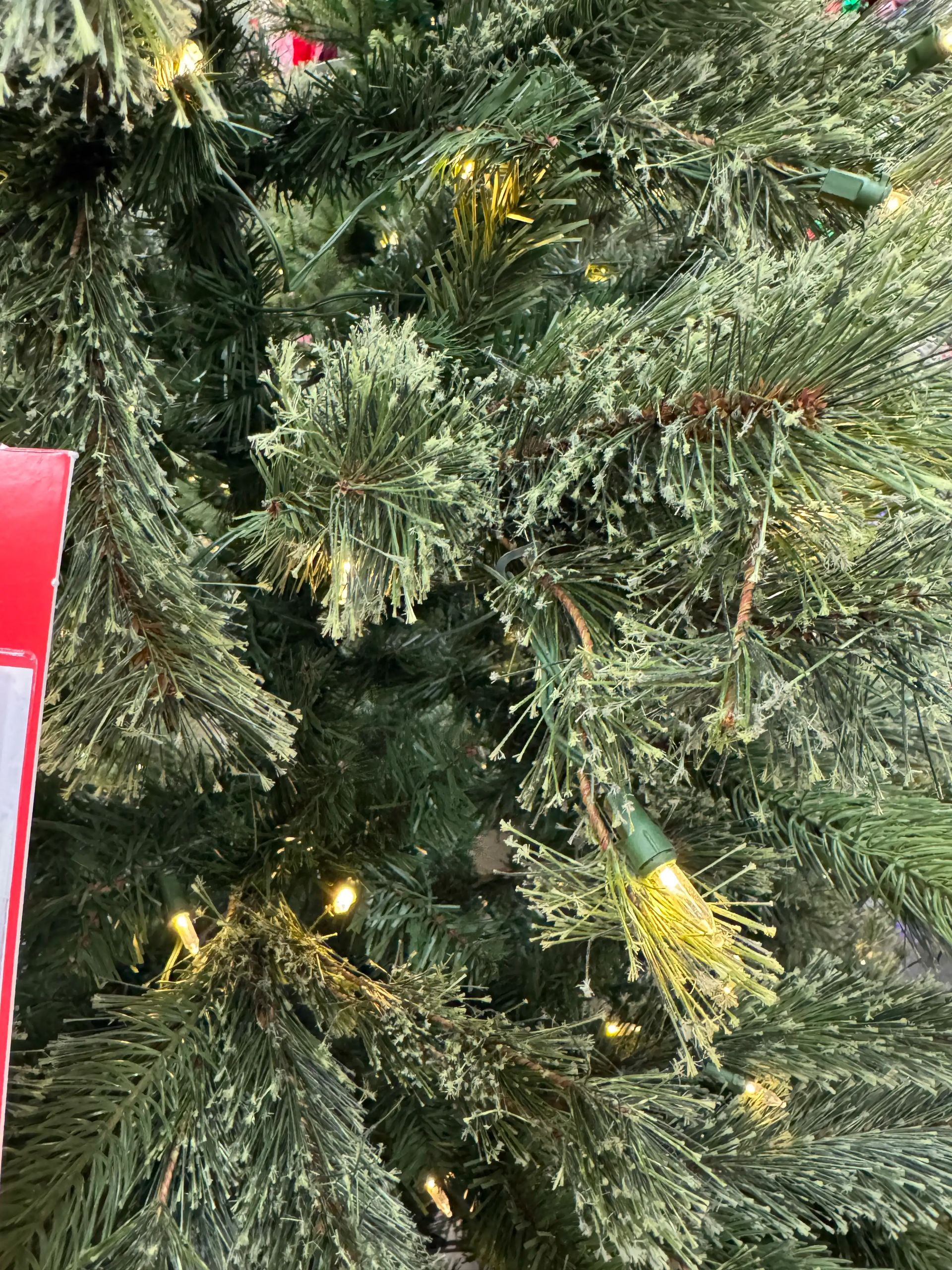Dense mixed PVC/PE spruce needles with frosted tips, warm white mini bulbs, full branching with minimal gaps
