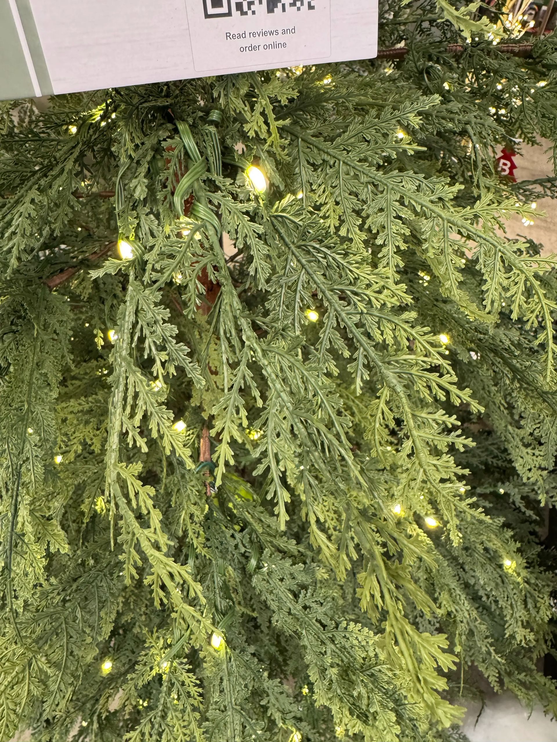 Dense molded PE cypress-style foliage with realistic texture, warm white micro LEDs throughout, minimal gaps visible