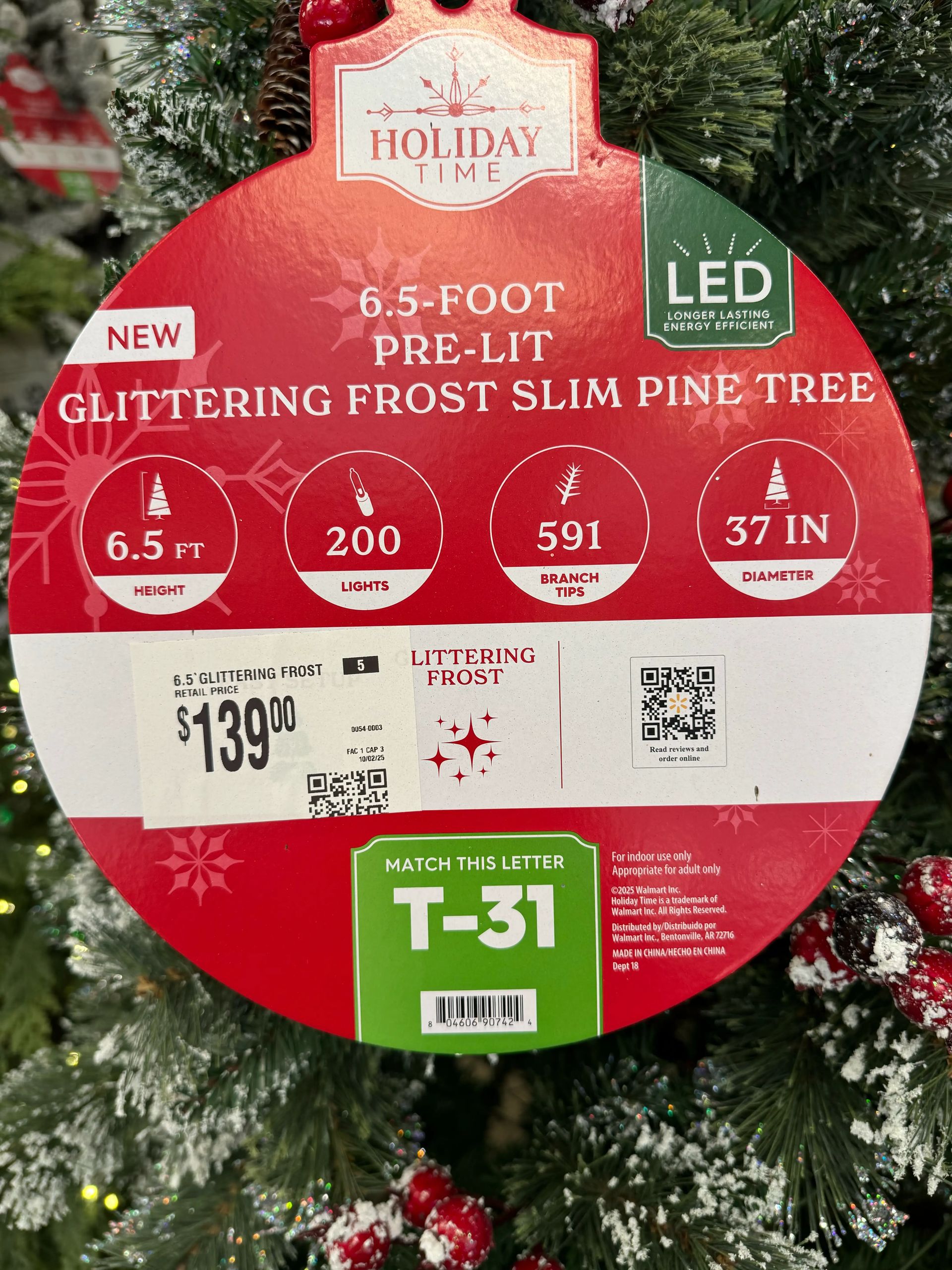 Product tag showing 6.5ft slim pine specs: 37in diameter, 200 LED lights, 591 branch tips, $139, Littering Frost style