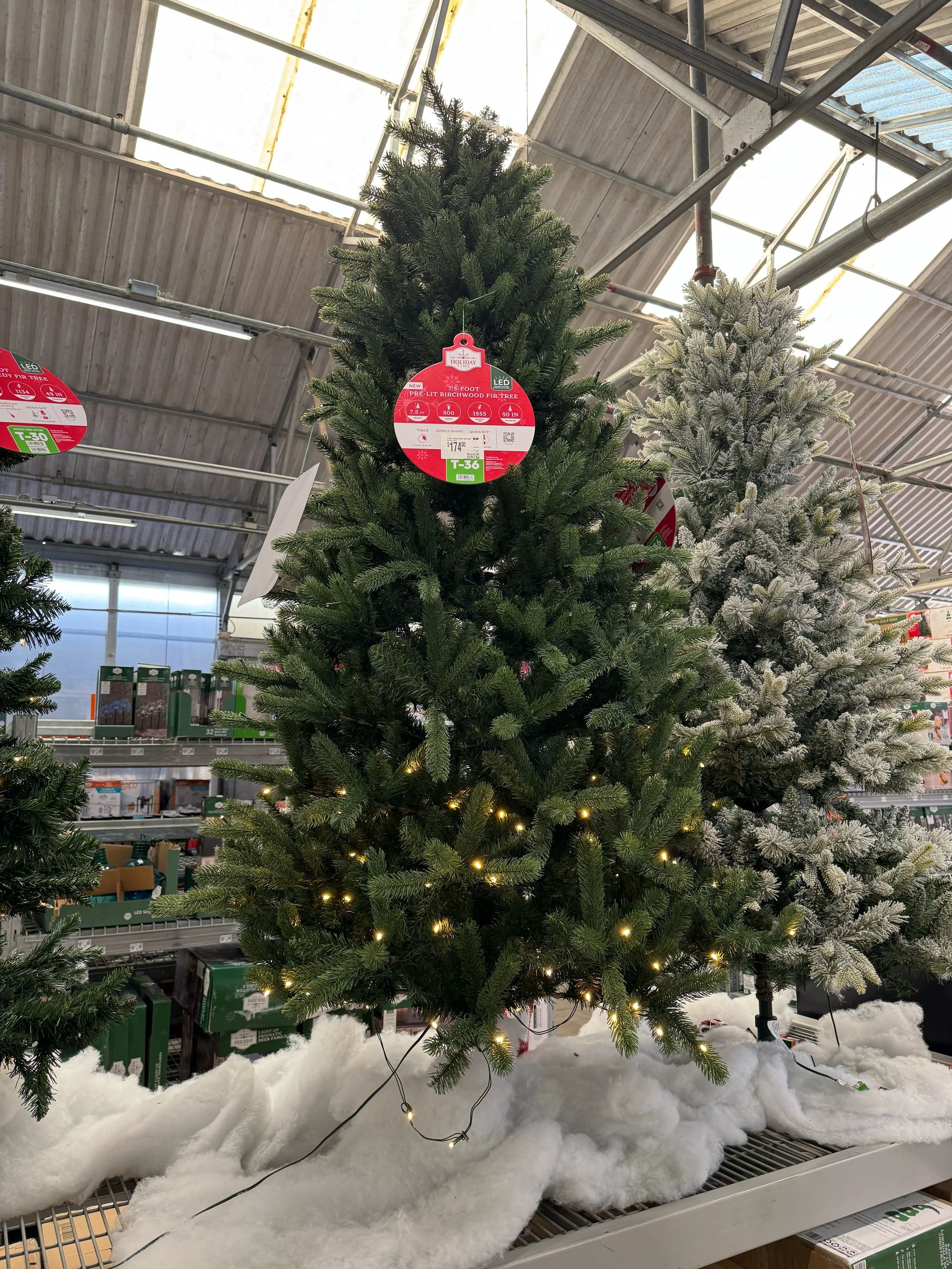 Full fir-style tree with dense green PVC branches, minimal gaps, warm white micro LEDs evenly distributed throughout