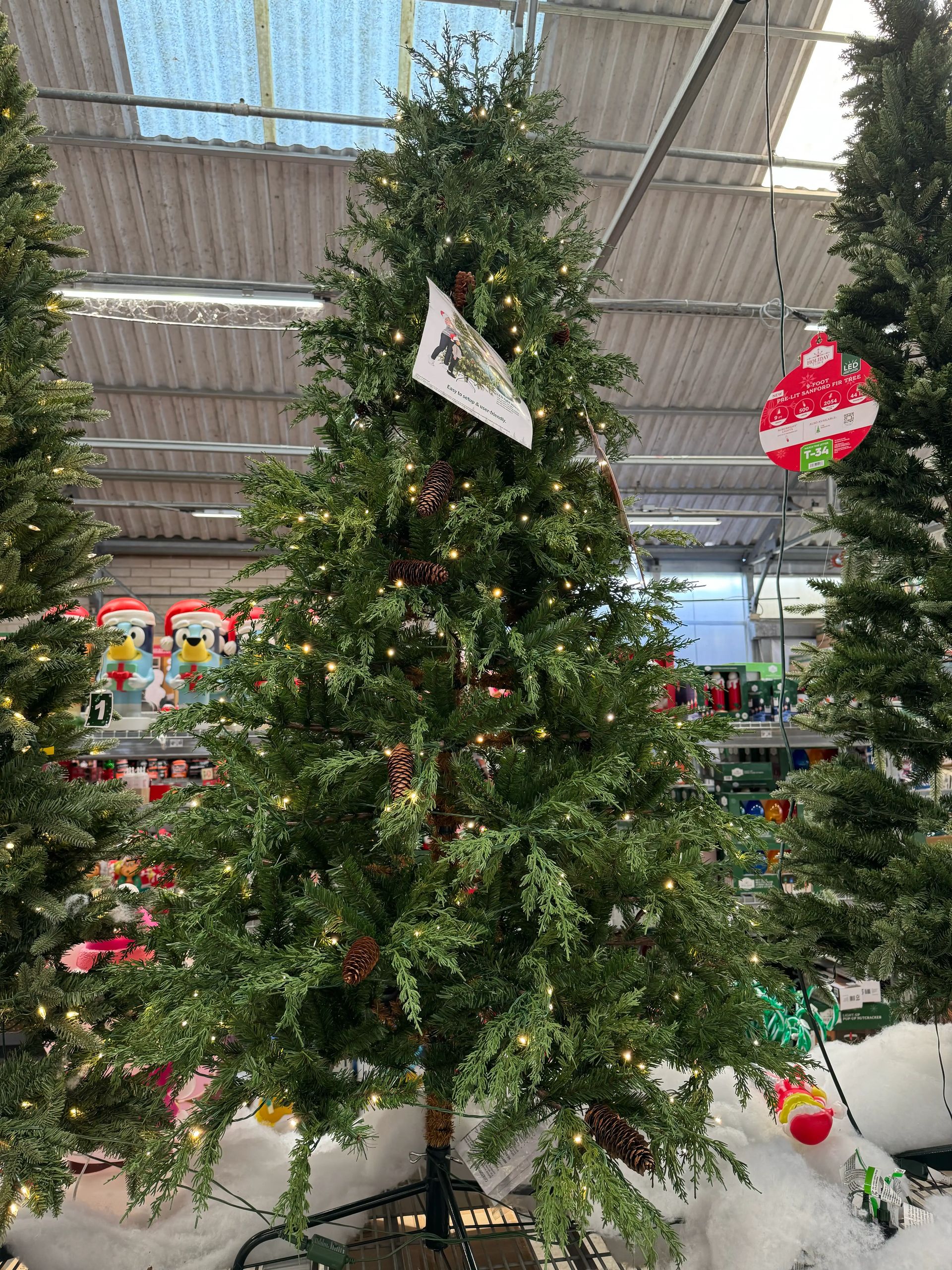 Dense cypress-style tree with realistic mixed needles, warm white lights throughout, minimal gaps, pinecone accents