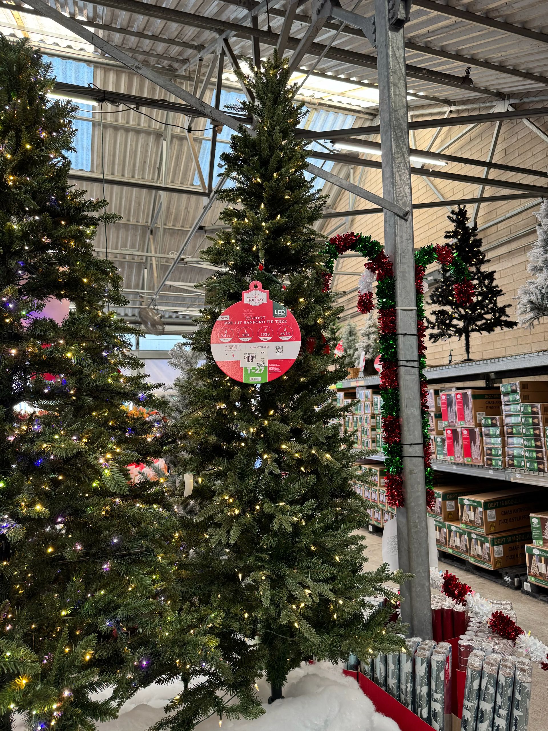Dense fir-style tree with mixed PVC/PE needles, warm white lights throughout, minimal visible gaps, full shape