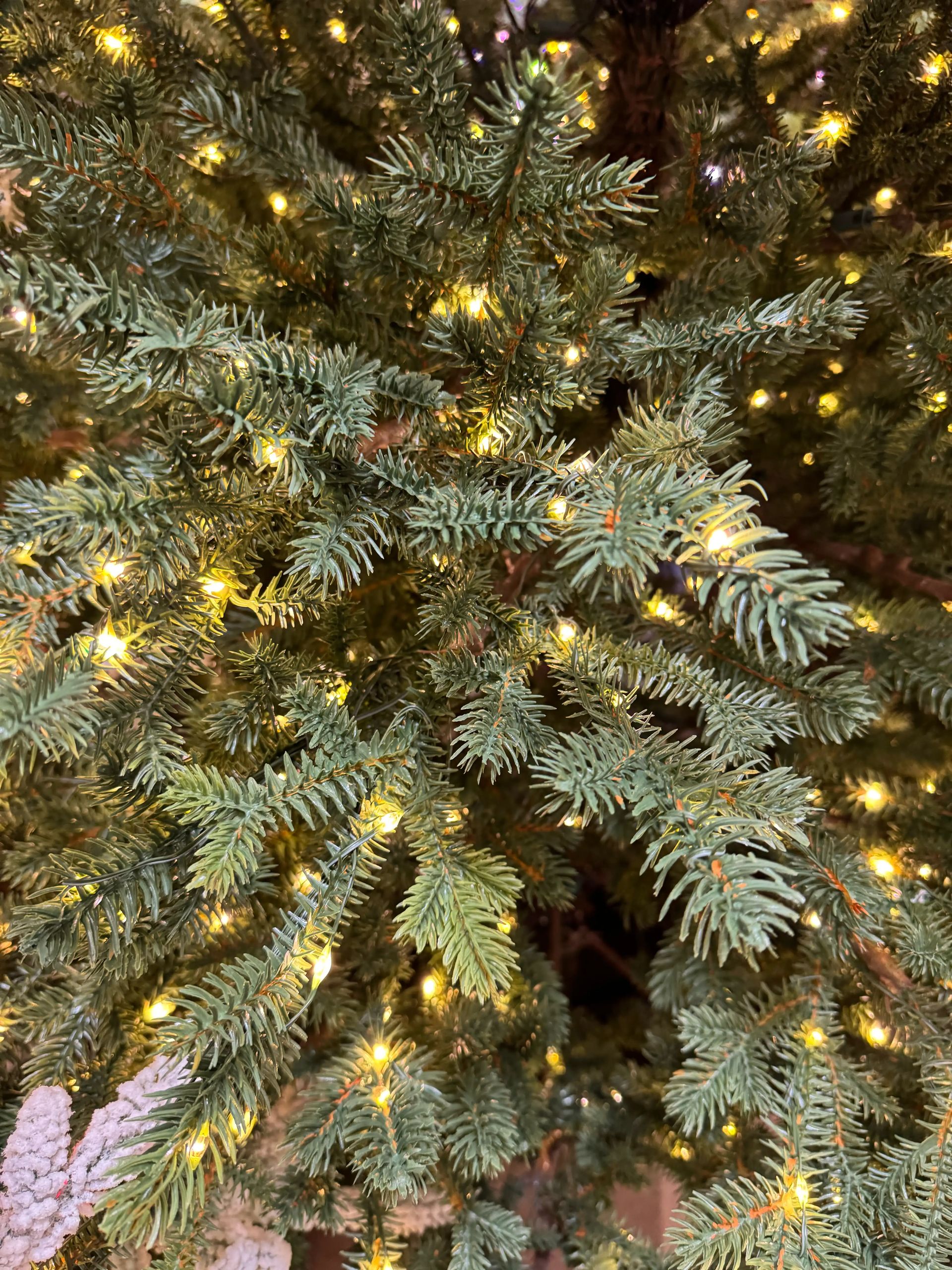 Dense molded PE fir needles in blue-green tones, warm micro LEDs throughout, realistic texture with no visible gaps