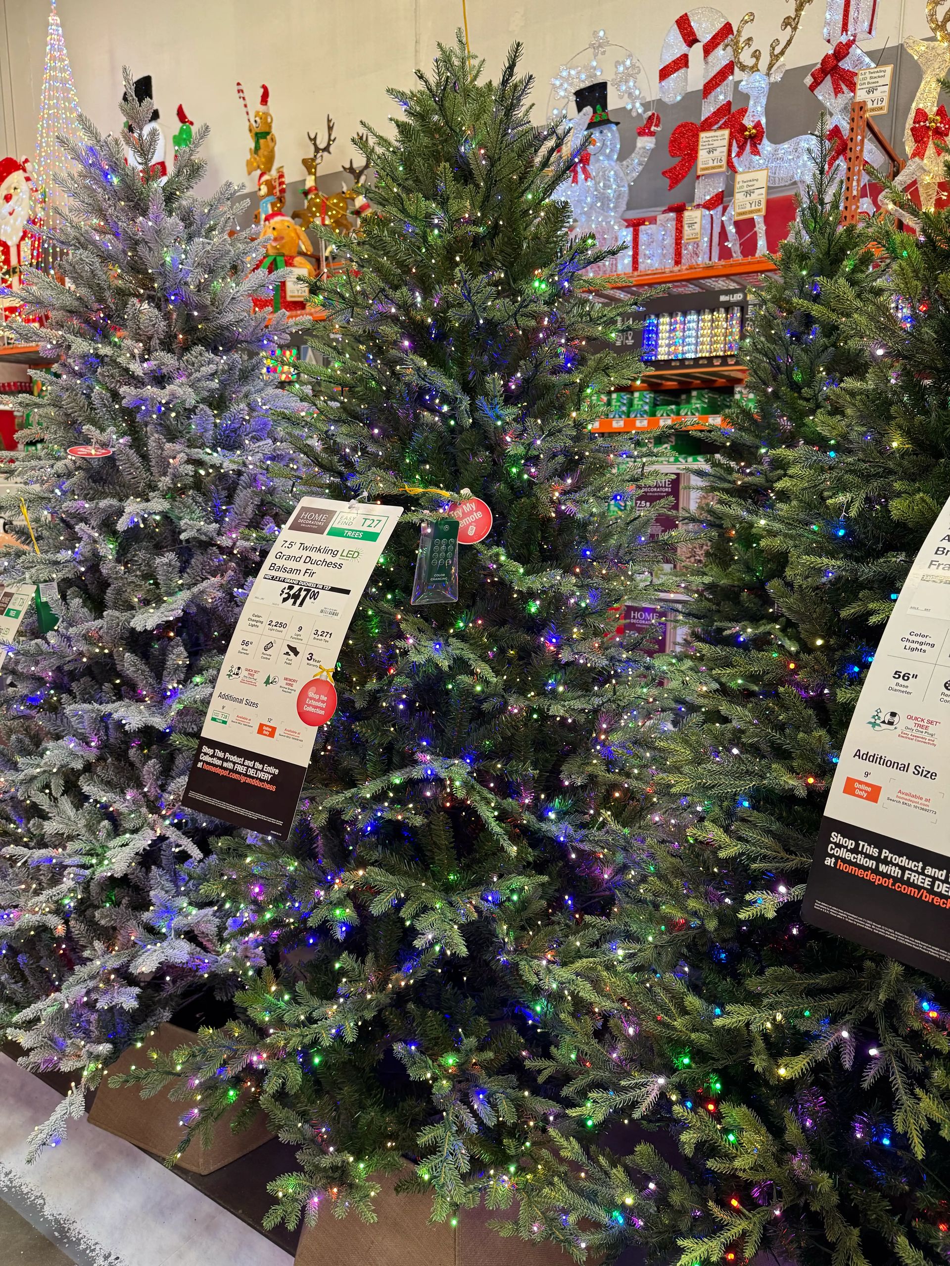 Dense mixed PVC/PE fir with moderate branching, multicolor LED lights throughout, full shape with minimal gaps