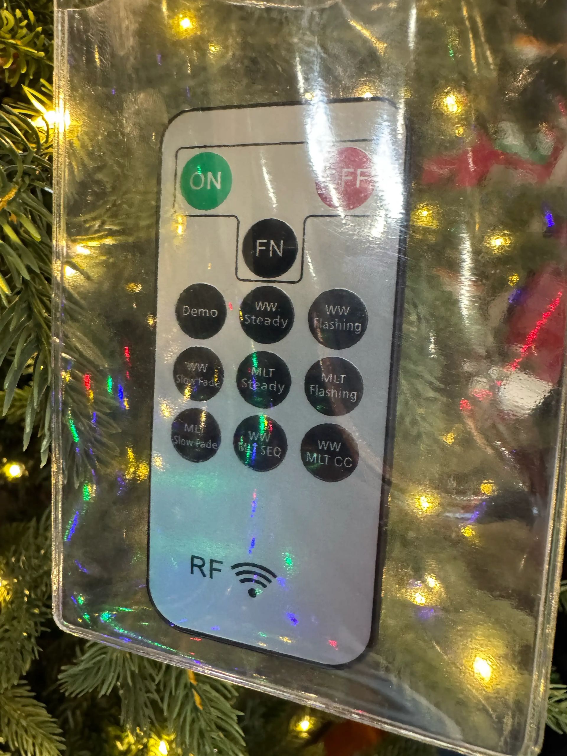 RF remote control for LED lights showing ON/OFF buttons, 9 function modes including steady, flashing, fade, and sequencing
