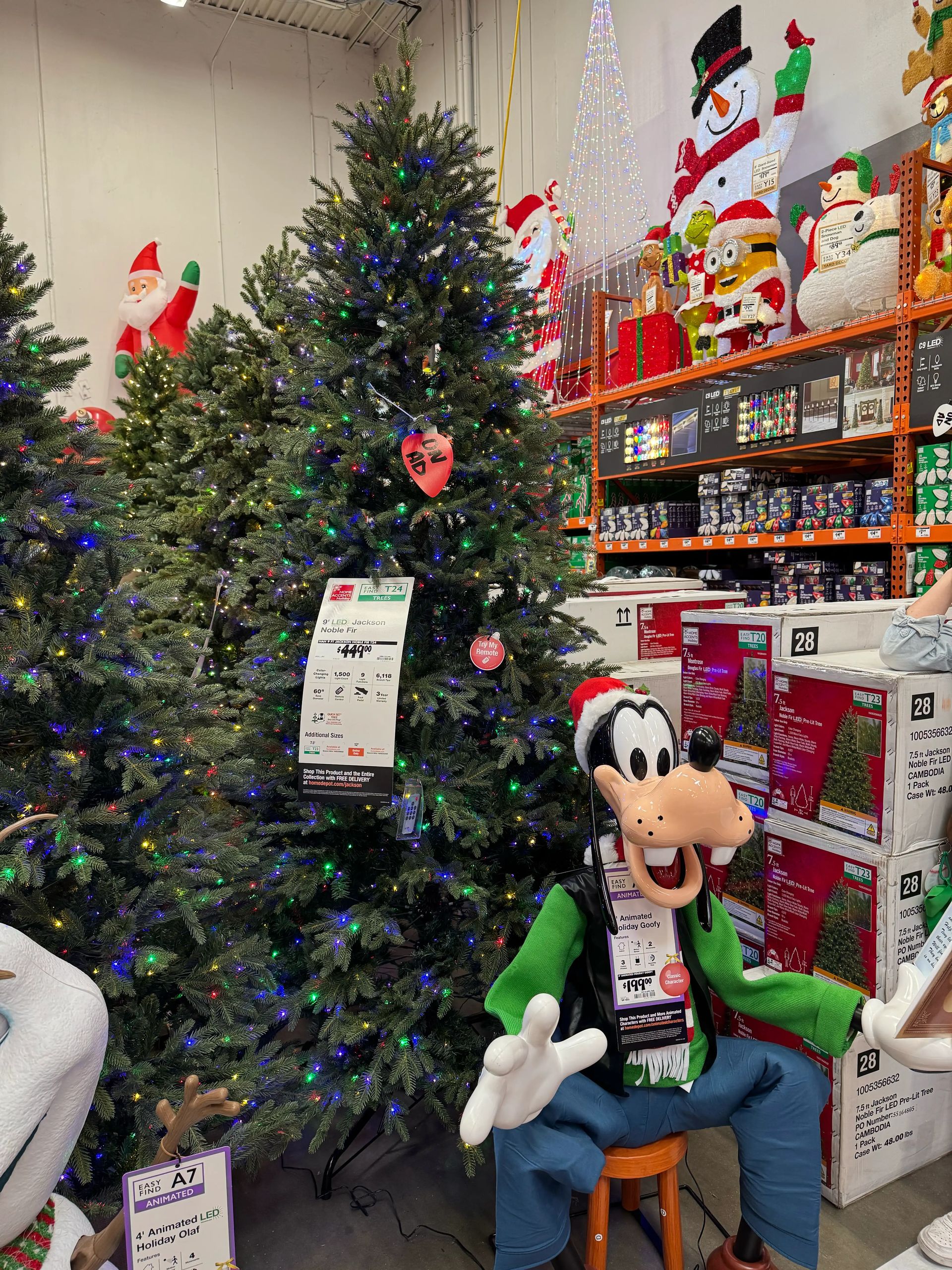 Dense mixed PVC/PE fir with full branching, minimal gaps, multicolor LED lights evenly distributed throughout