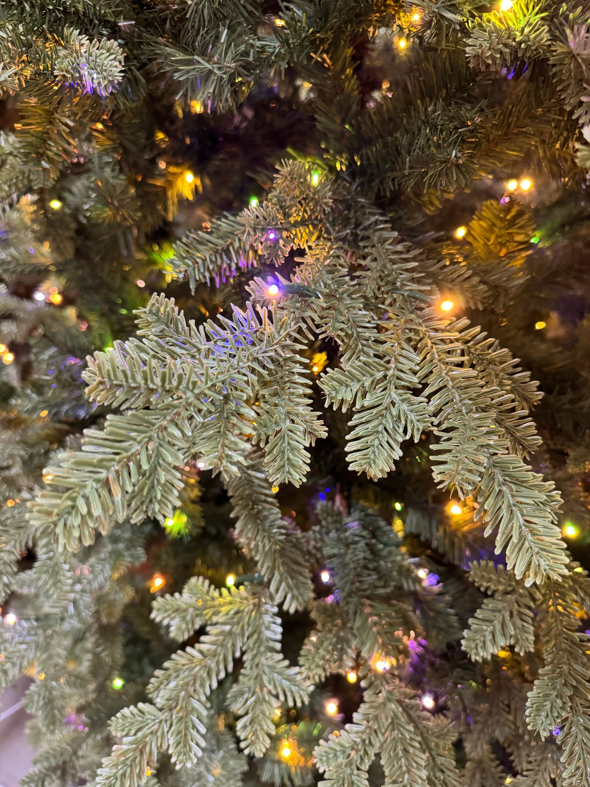 Mixed PVC and molded PE fir needles, dense warm and multicolor micro LED coverage, frosted sage green color