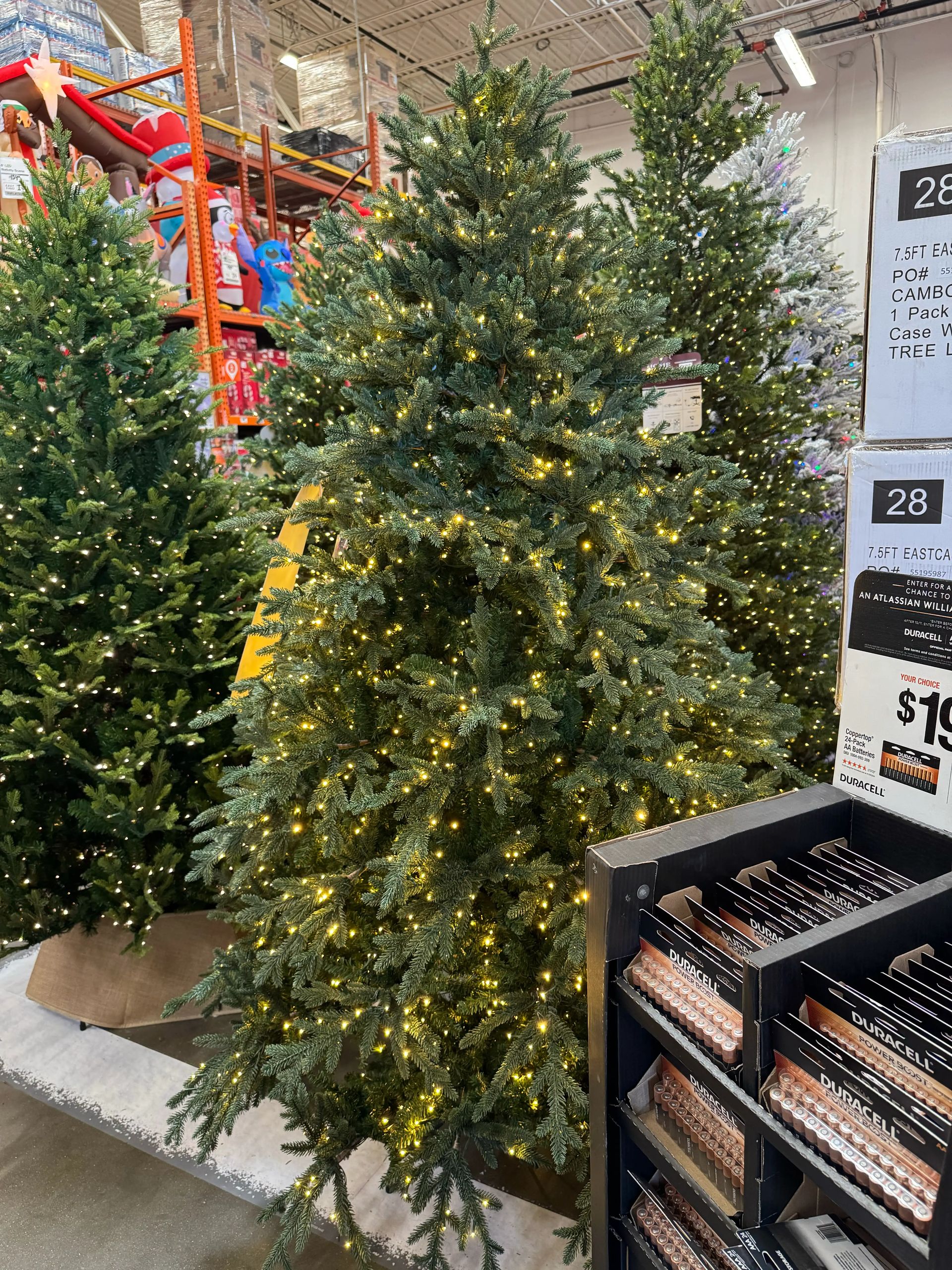 Dense fir-style tree with mixed PVC/PE needles, warm white micro LEDs throughout, full shape with minimal gaps