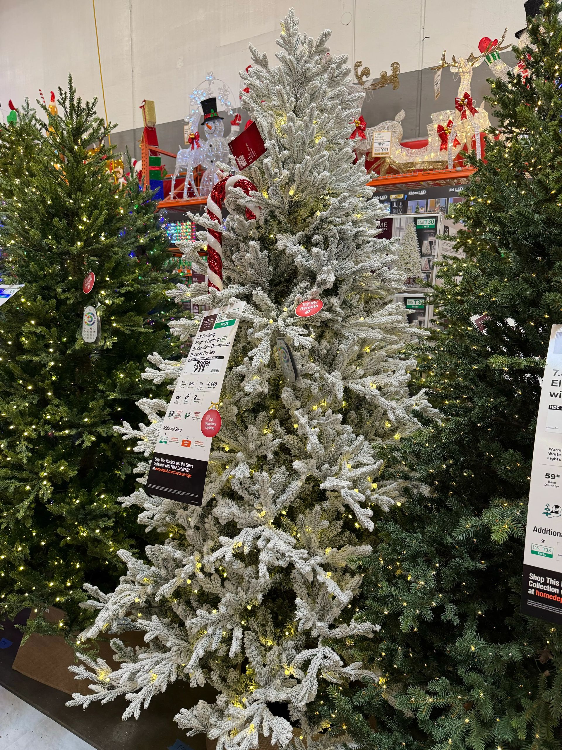Heavily flocked white fir-style tree with warm white micro LEDs, dense branch coverage, minimal visible gaps