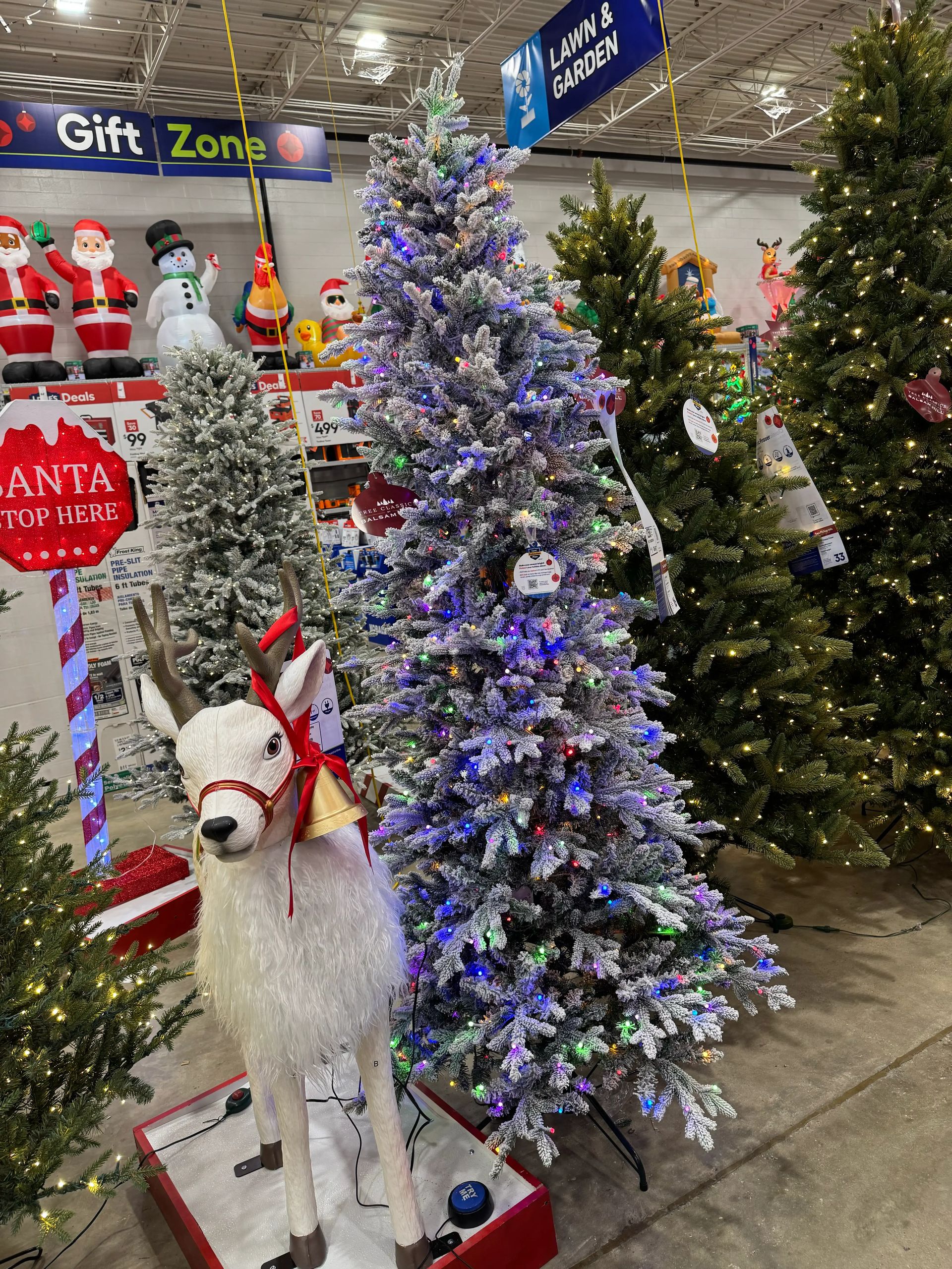 Heavily flocked fir-style tree with dense white coating, mixed PVC/PE needles, multicolor LED lights, full shape