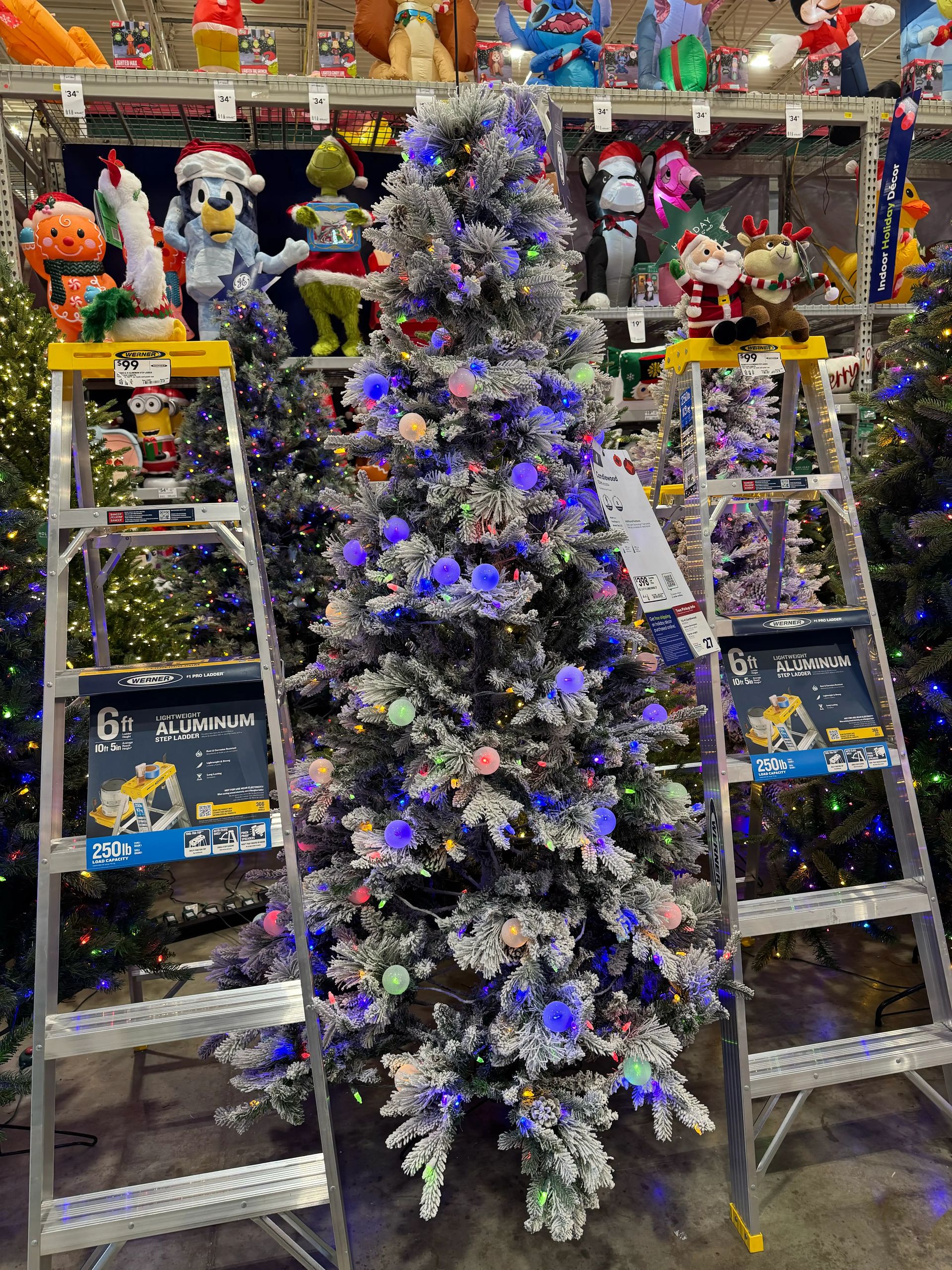 Flocked pine with heavy white frosting, mixed PVC/PE needles, dense coverage, large multicolor globe bulbs throughout