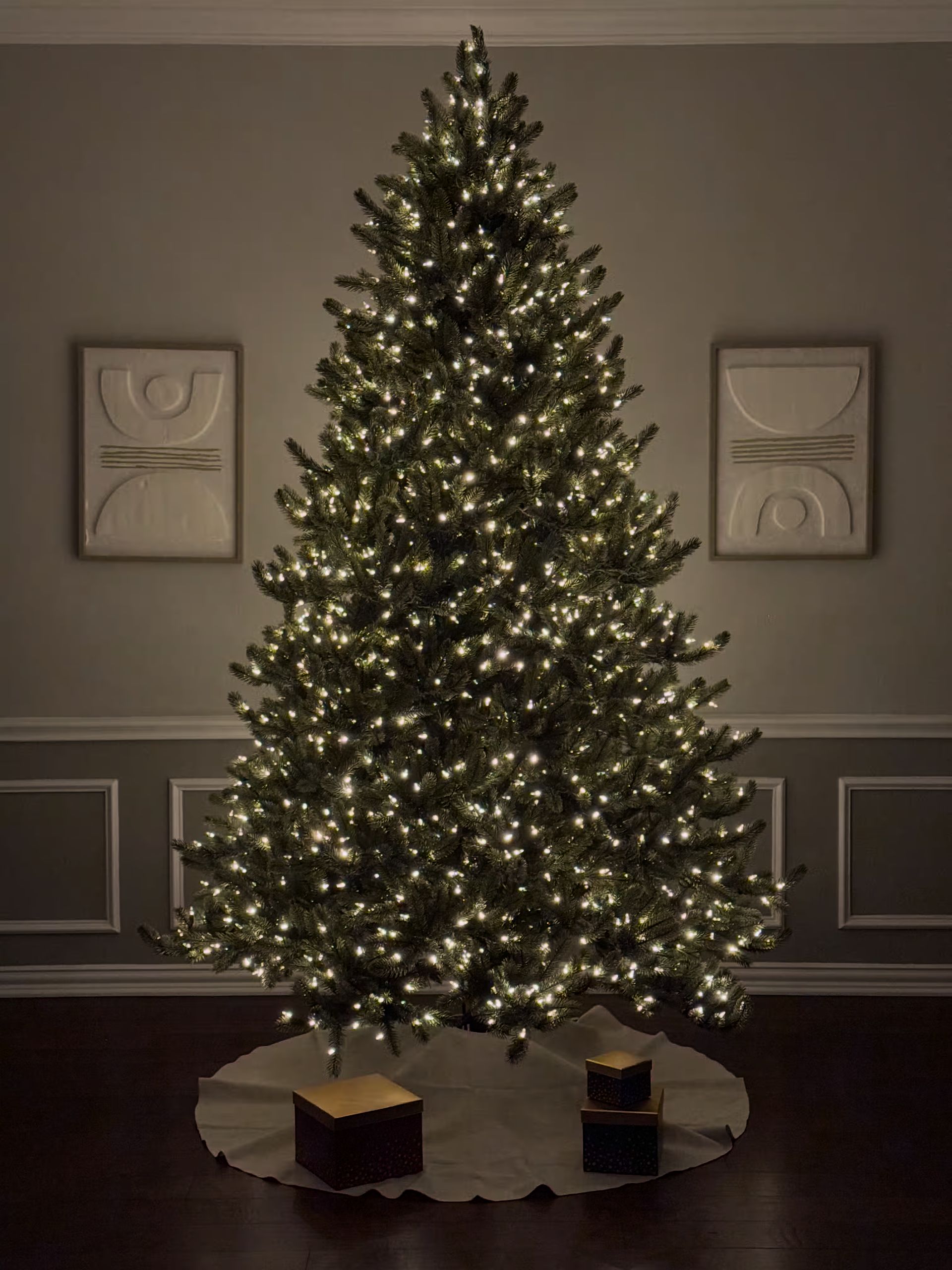 Room lights off with clear lights on their lowest dim setting creating a cozy atmosphere with little light being cast into the room.