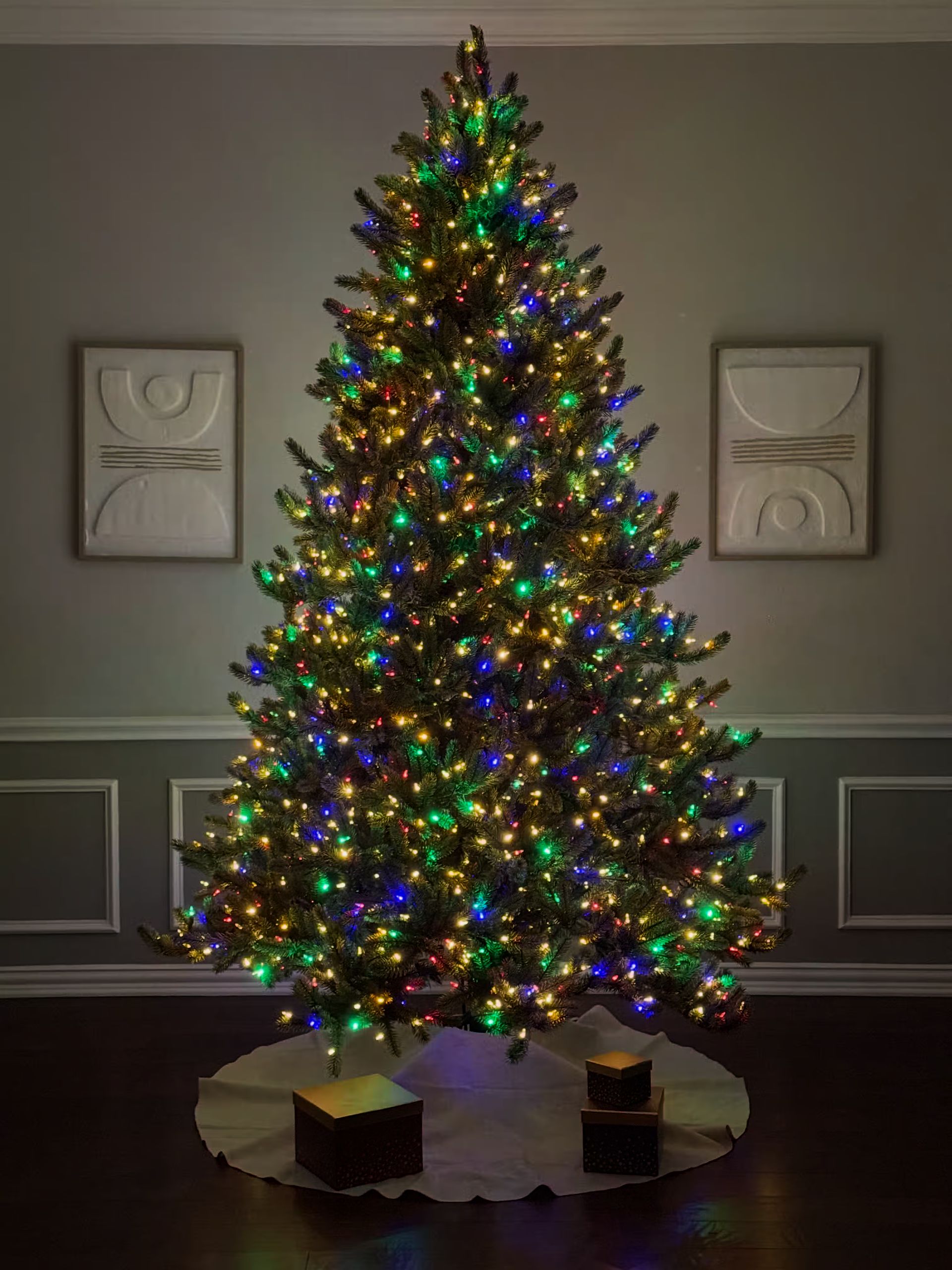 Room lights off with clear+color lights on their lowest dim setting creating a cozy atmosphere with little light being cast into the room.