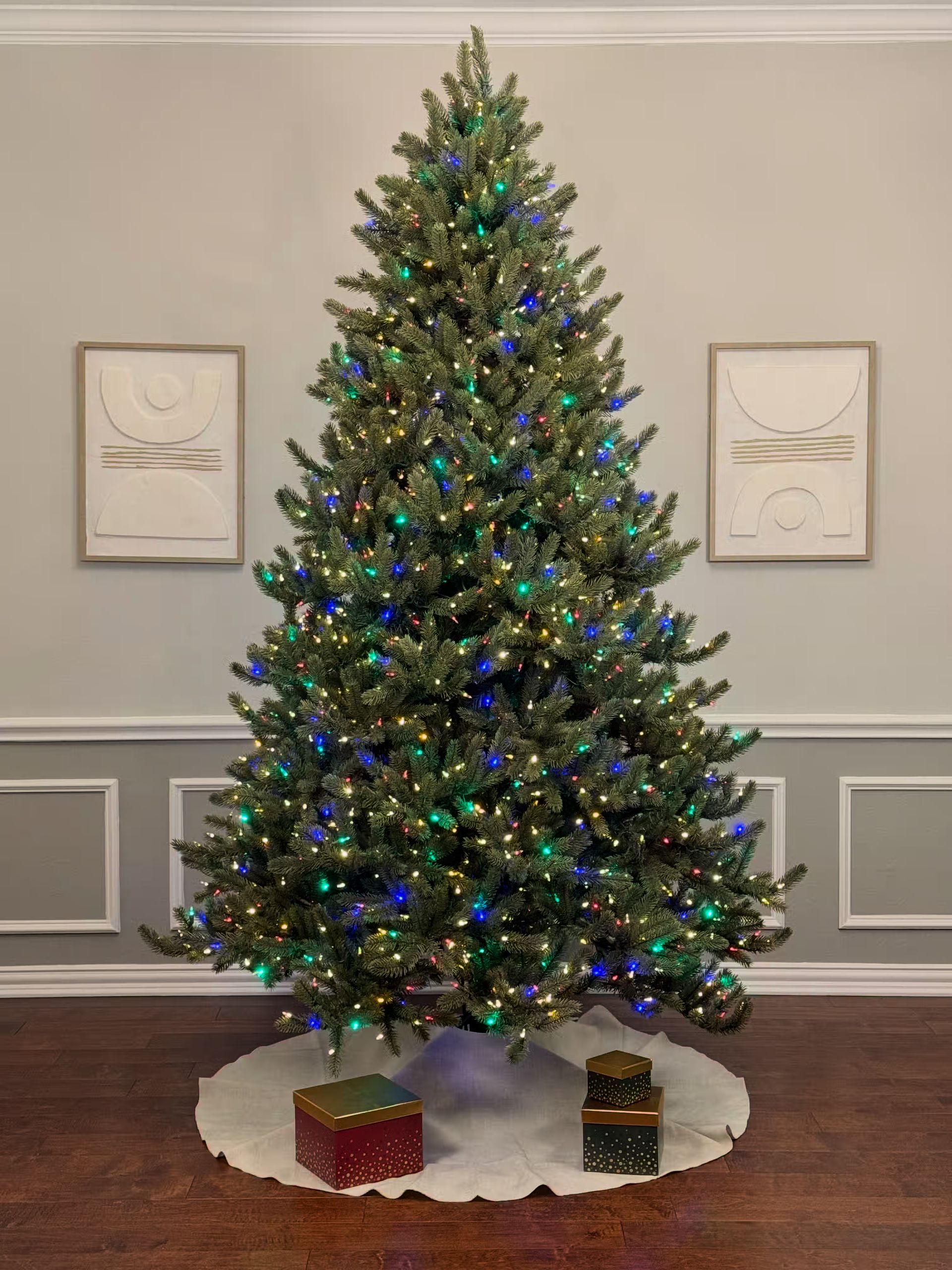 Room lights on with a very dense 8ft tree with clear+color lights also on.